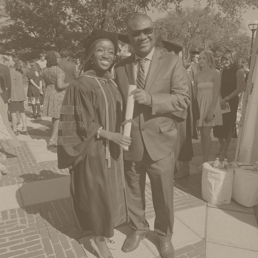 Amy Kwarteng, Alex Kwarteng Foundation Co-founder and Southland College Prep alumna, in graduation garb with her father, Dr. Alex Kwarteng.