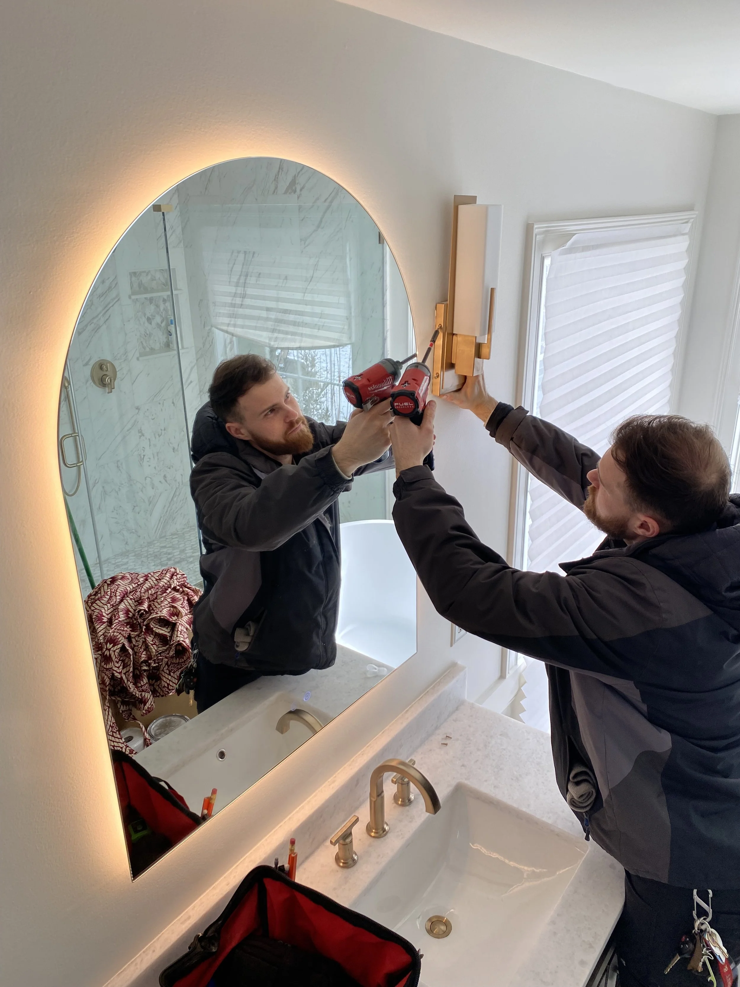 Seamless over-the-range microwave mounting with proper venting in a Fishers home.