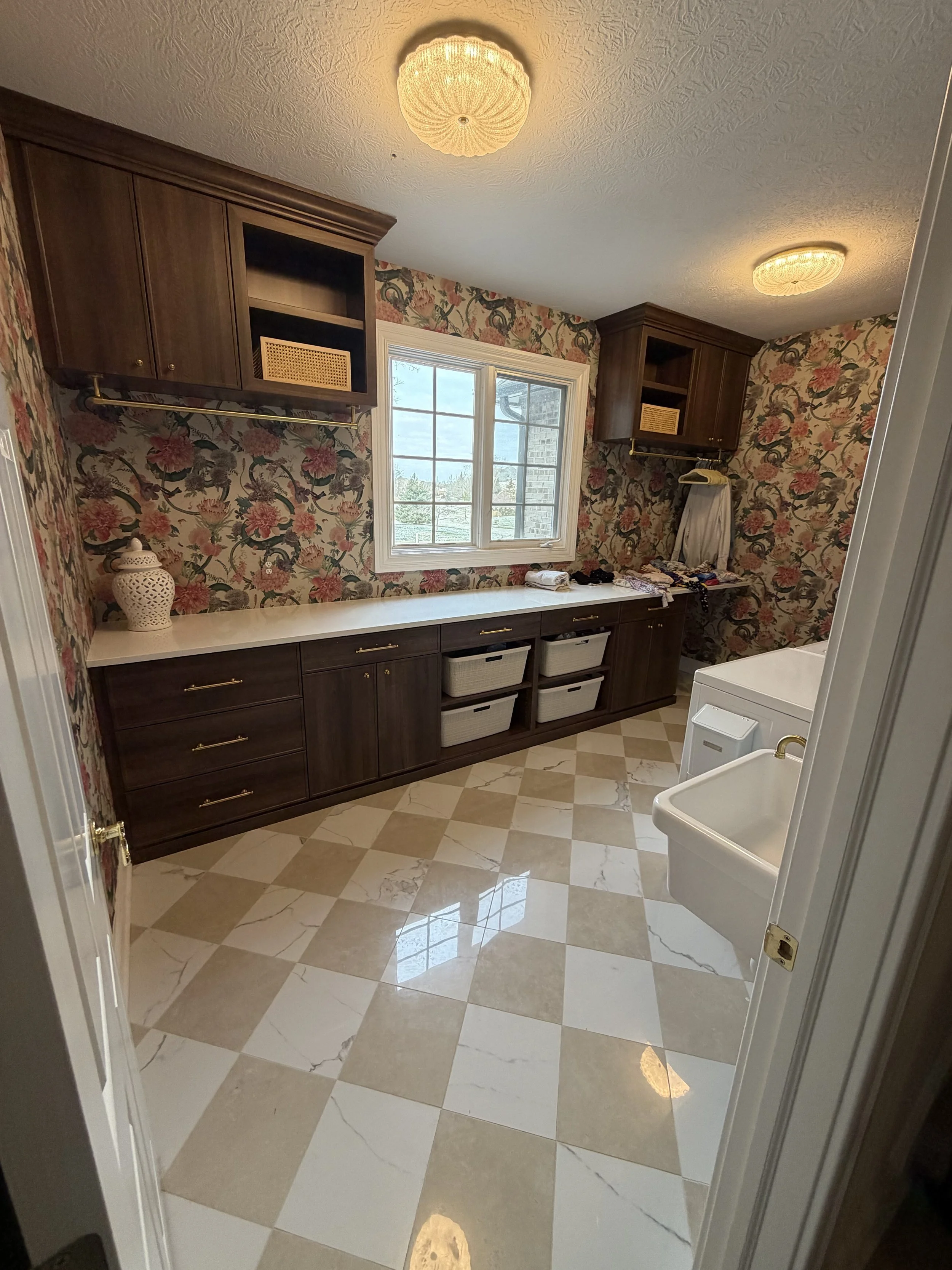 Indy handyman Cade performing a precision measurement for a custom install.