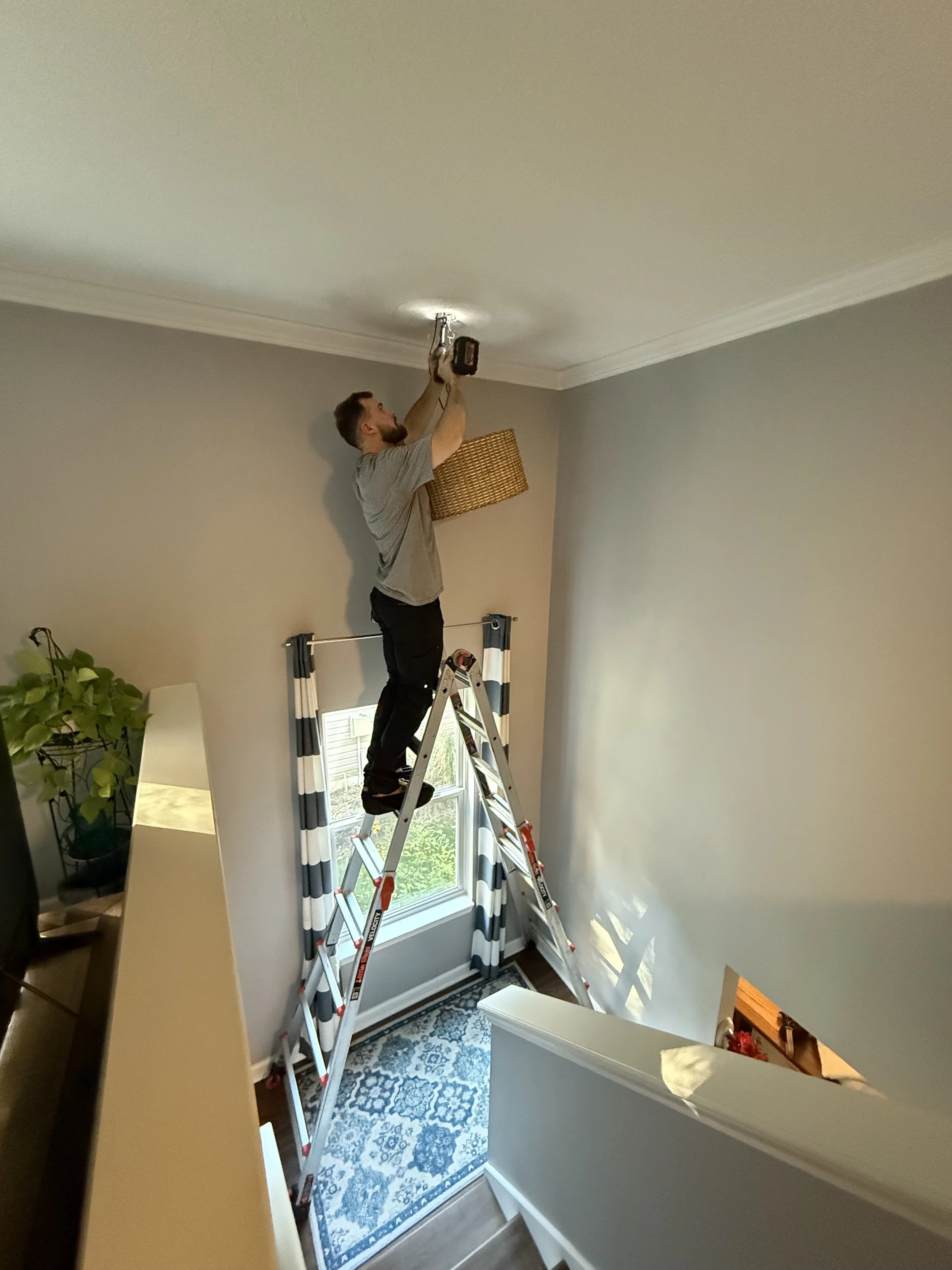 Installing a smart home thermostat for improved energy efficiency in Greenwood.