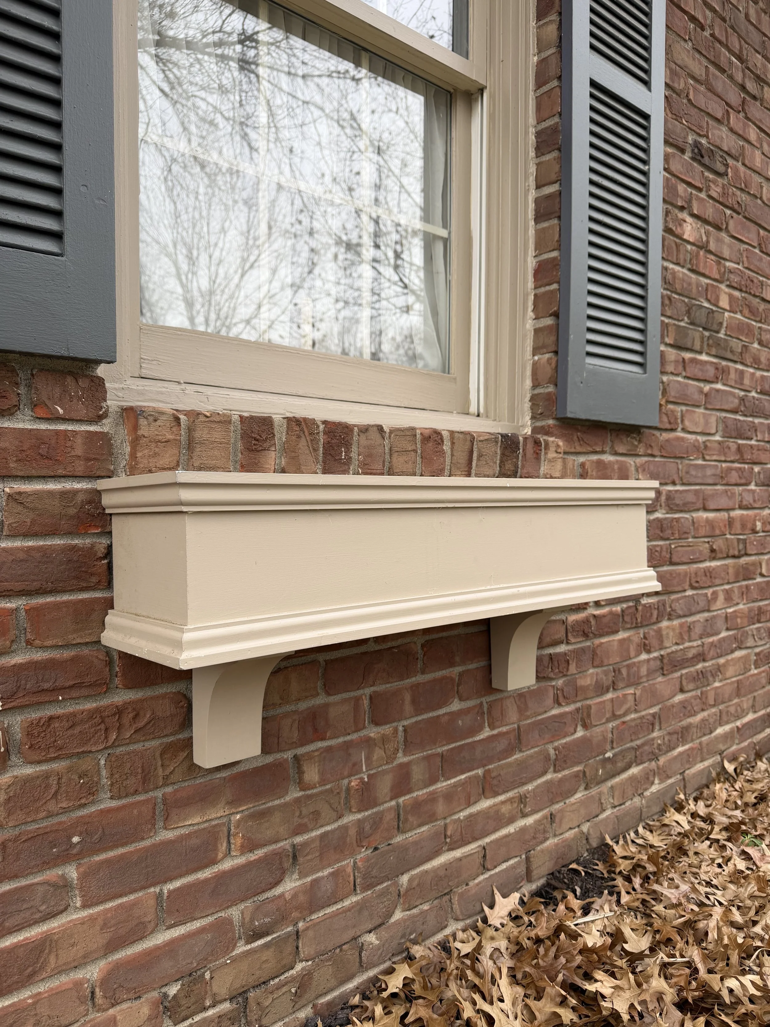 Building a custom-fit wooden mantle for a fireplace restoration in Indianapolis.