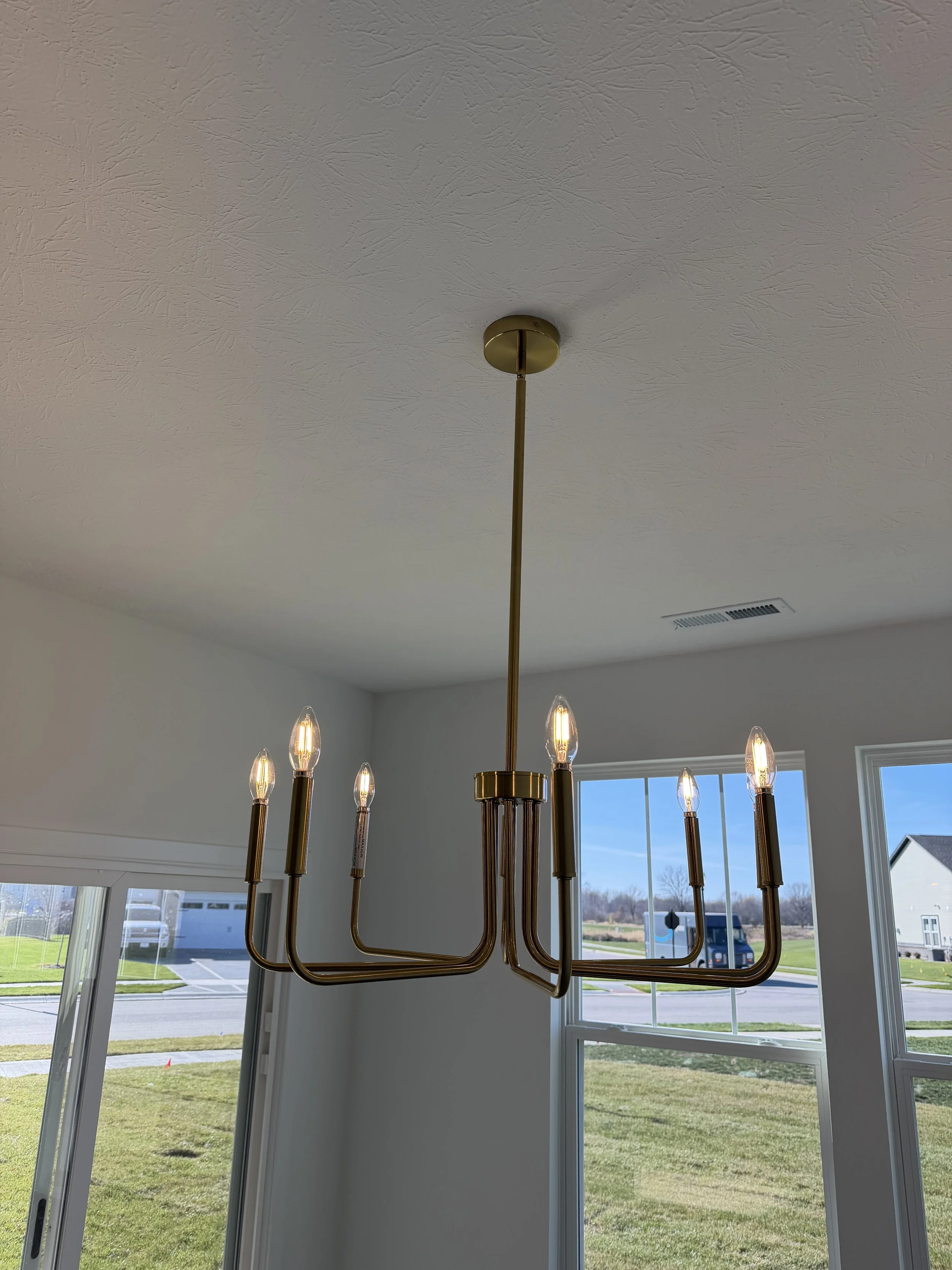 Fine carpentry repairs on a historic home's door frame in Broad Ripple.