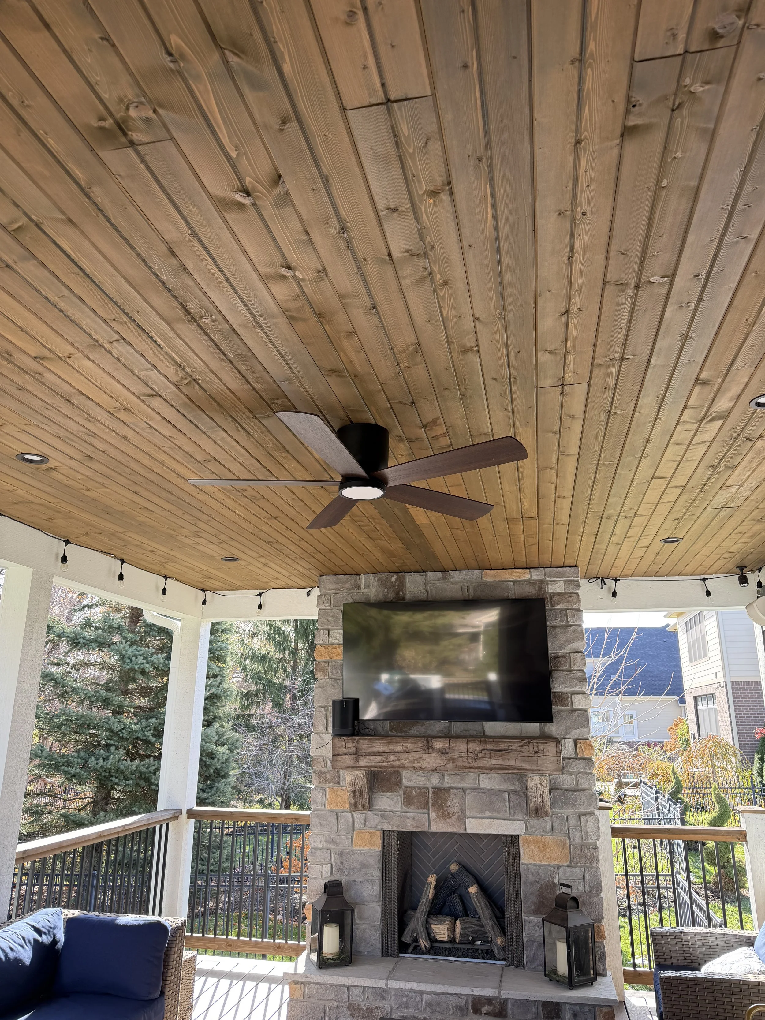 Seamless ceiling fan installation in a high-ceiling living room in Noblesville.
