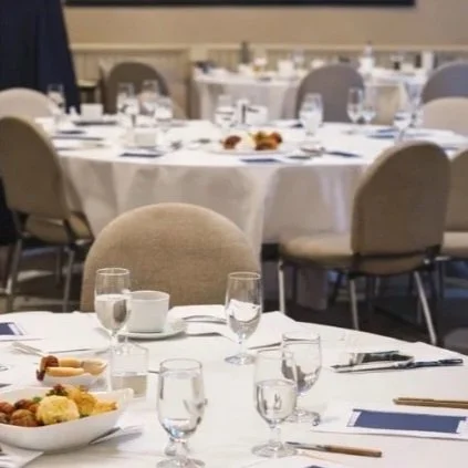 Corporate and ministry events table setup with formal seating for meetings, conferences, and church functions.