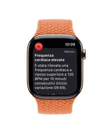 Apple Watch che mostra una notifica di frequenza cardiaca elevata, con cinturino arancione.