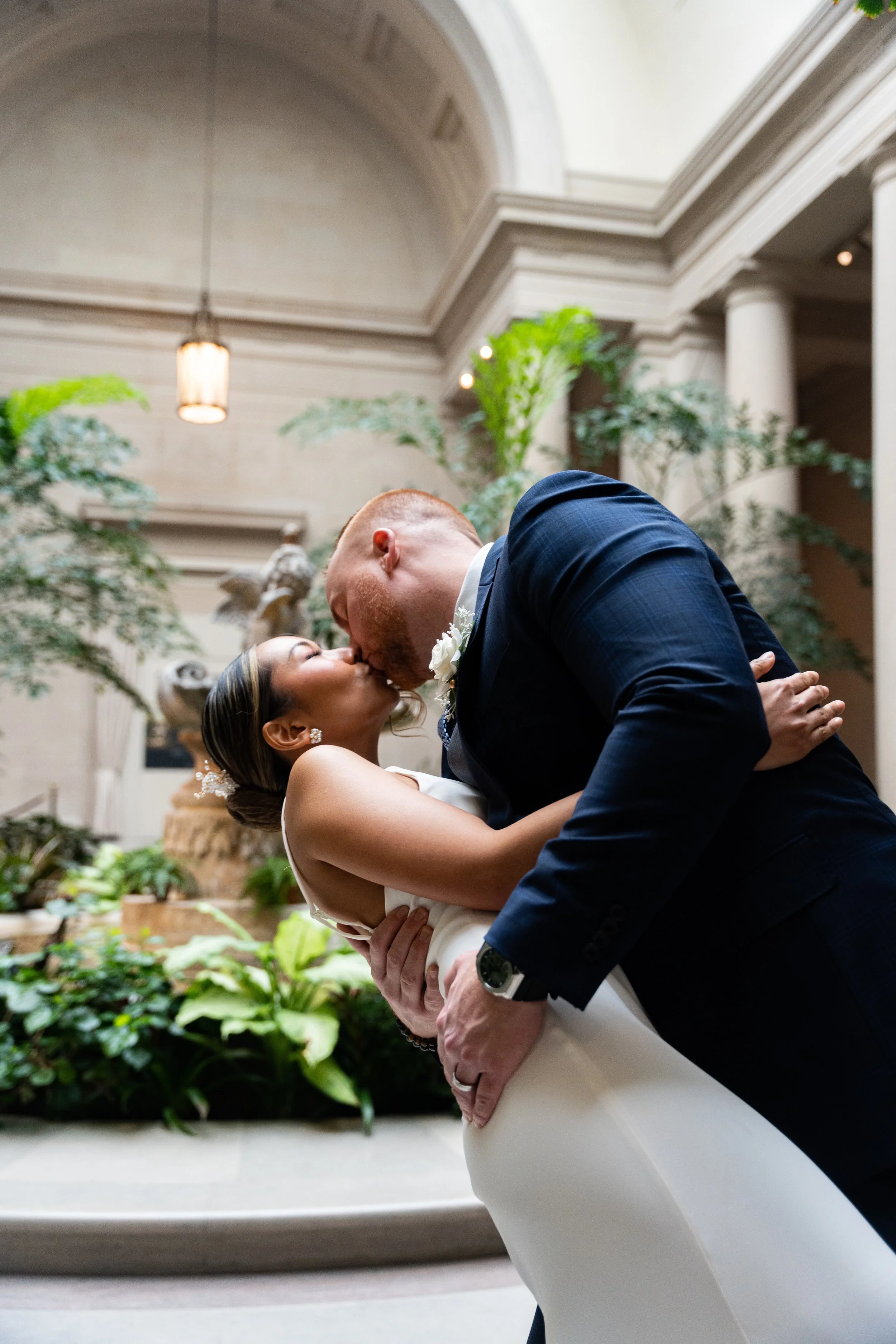 Laurie’s customers, Larissa and Emmett, just married walking off the aisle together.
