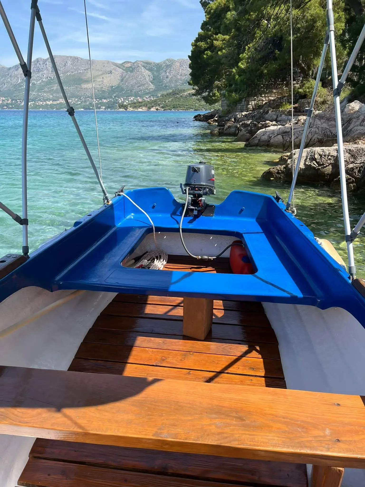 Interior view of a clean and maintained rental boat deck in Cavtat.