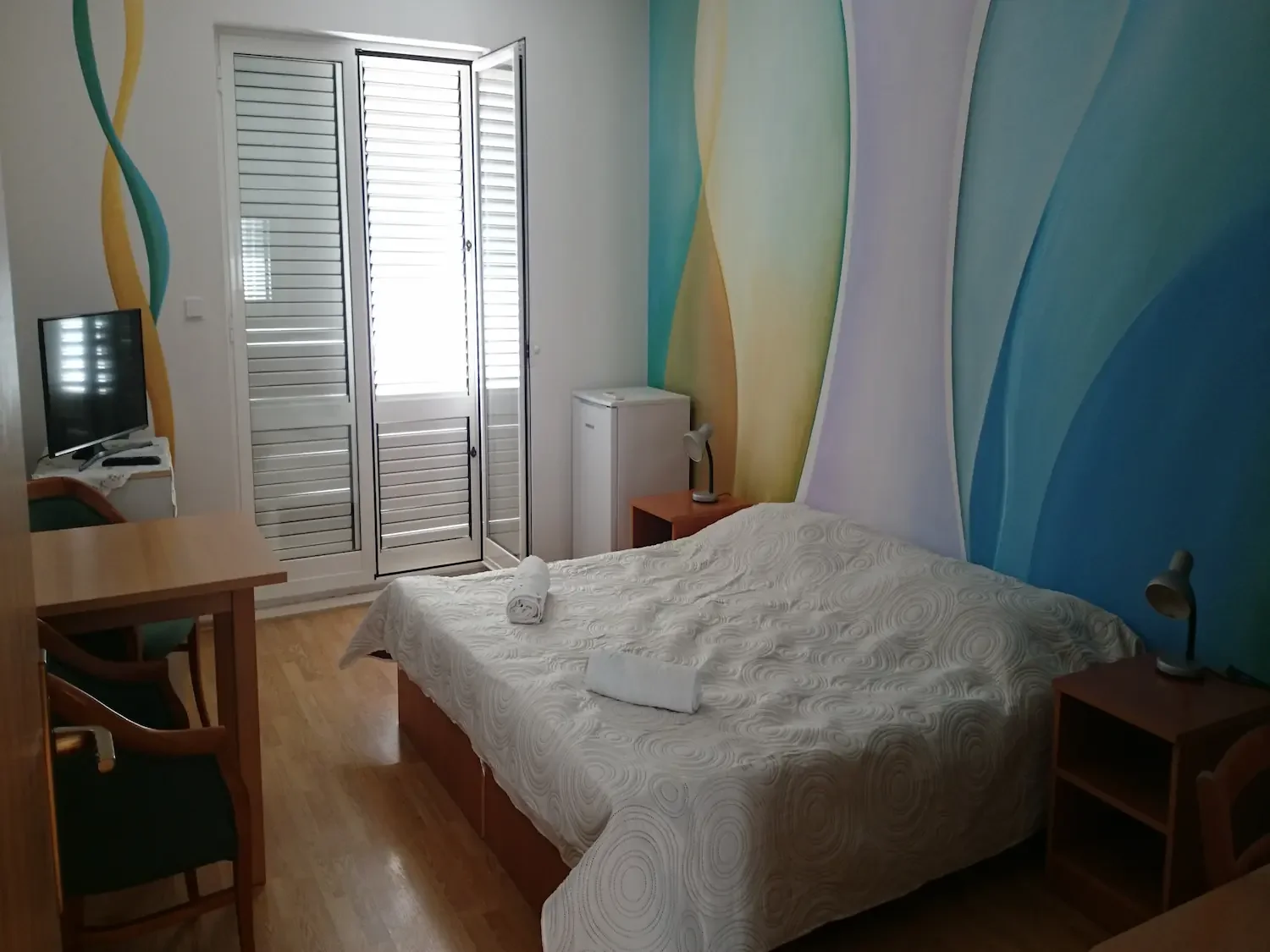 Comfortable bedroom interior at Sea Front Apartments Miljanic in Cavtat, near the beach.