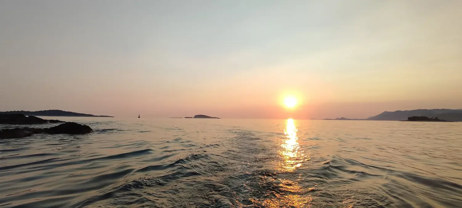Breathtaking sunset over the horizon during a private boat tour in Cavtat.