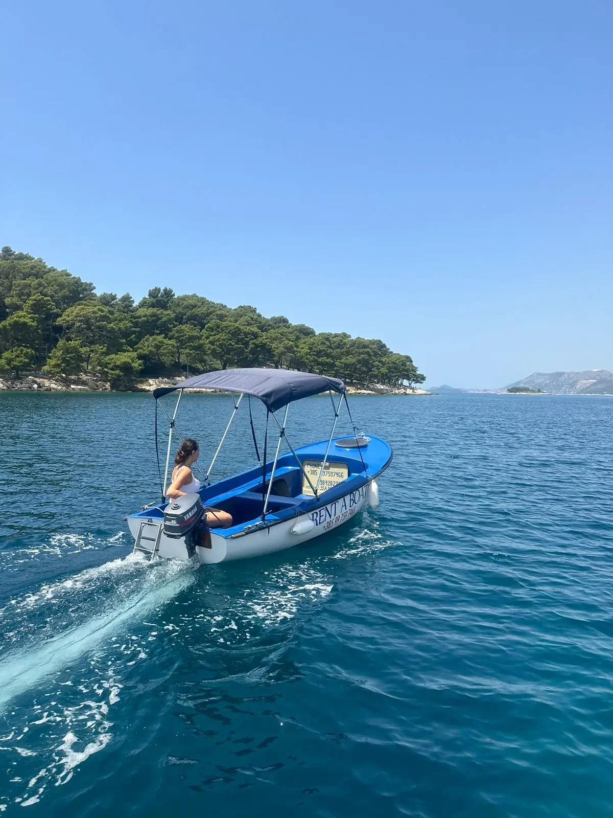 Enjoying a boat ride near Cavtat islands with a reliable local boat rental service.
