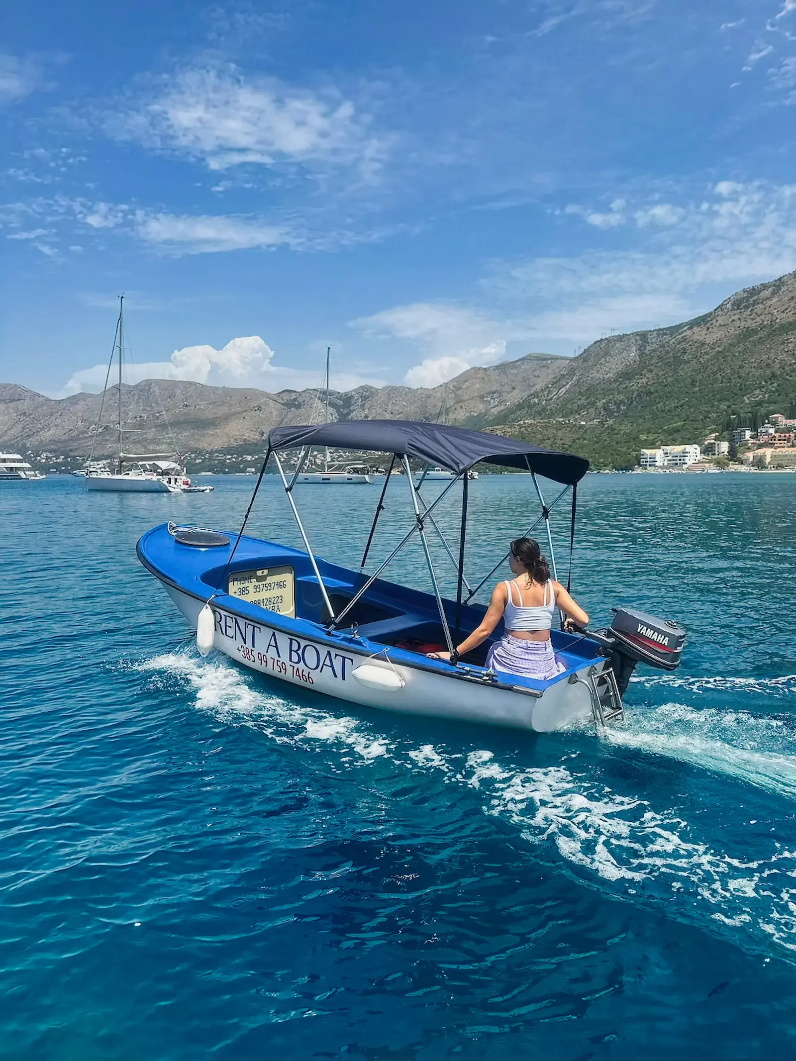 Pasara boat rental exploring hidden bays near Cavtat, Croatia. Local Boats Cavtat.