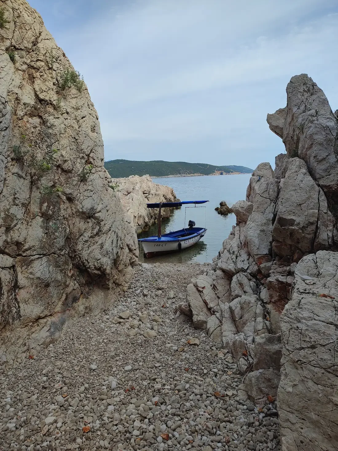Hidden rocky cove near Cavtat accessible only by a small rental boat.