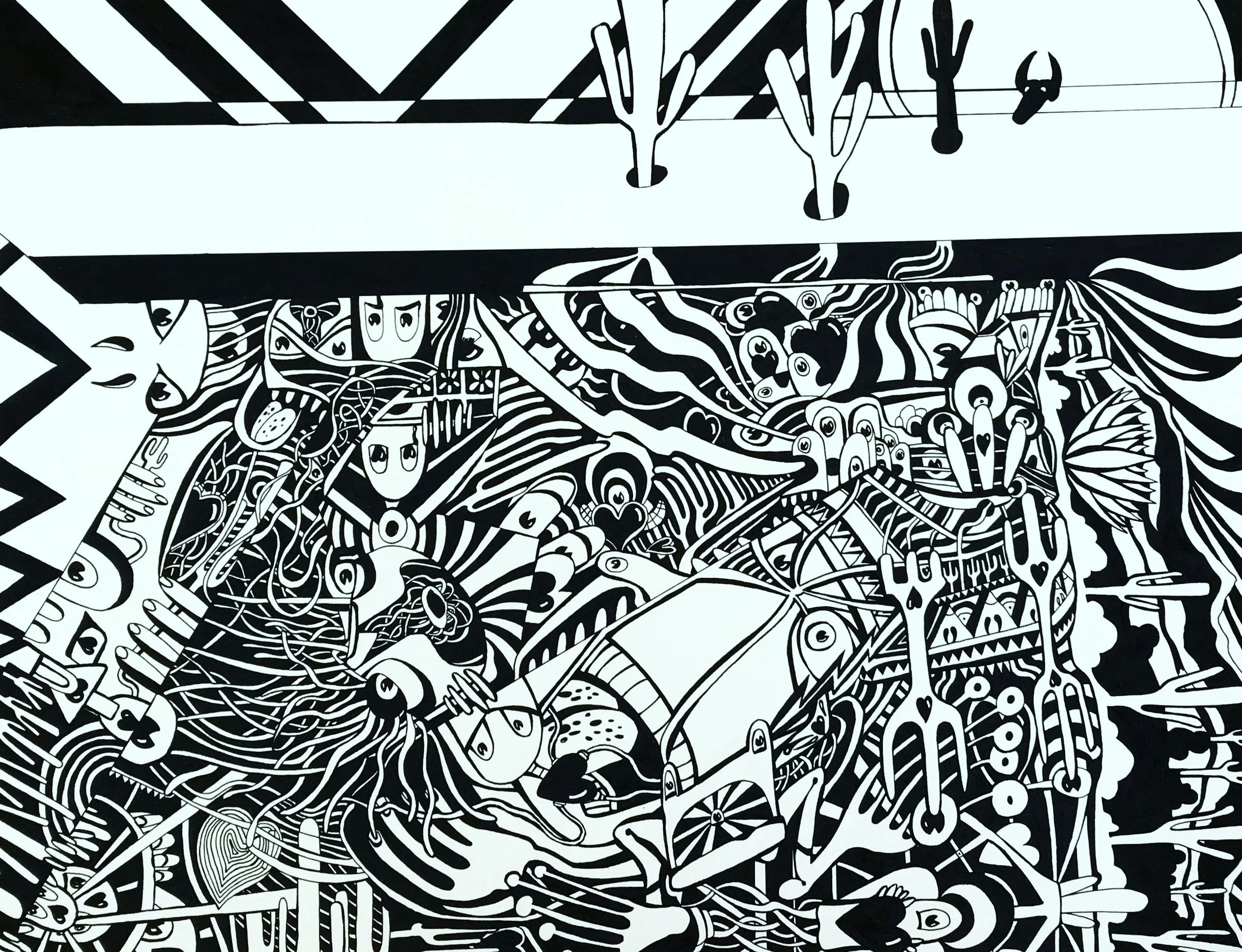 Black and white abstract graffiti mural featuring various distorted faces, figures, and objects in a chaotic, intricate design.