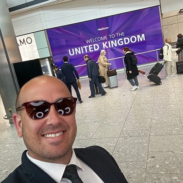 Dima the driver waiting for passangers at Heathrow Airport