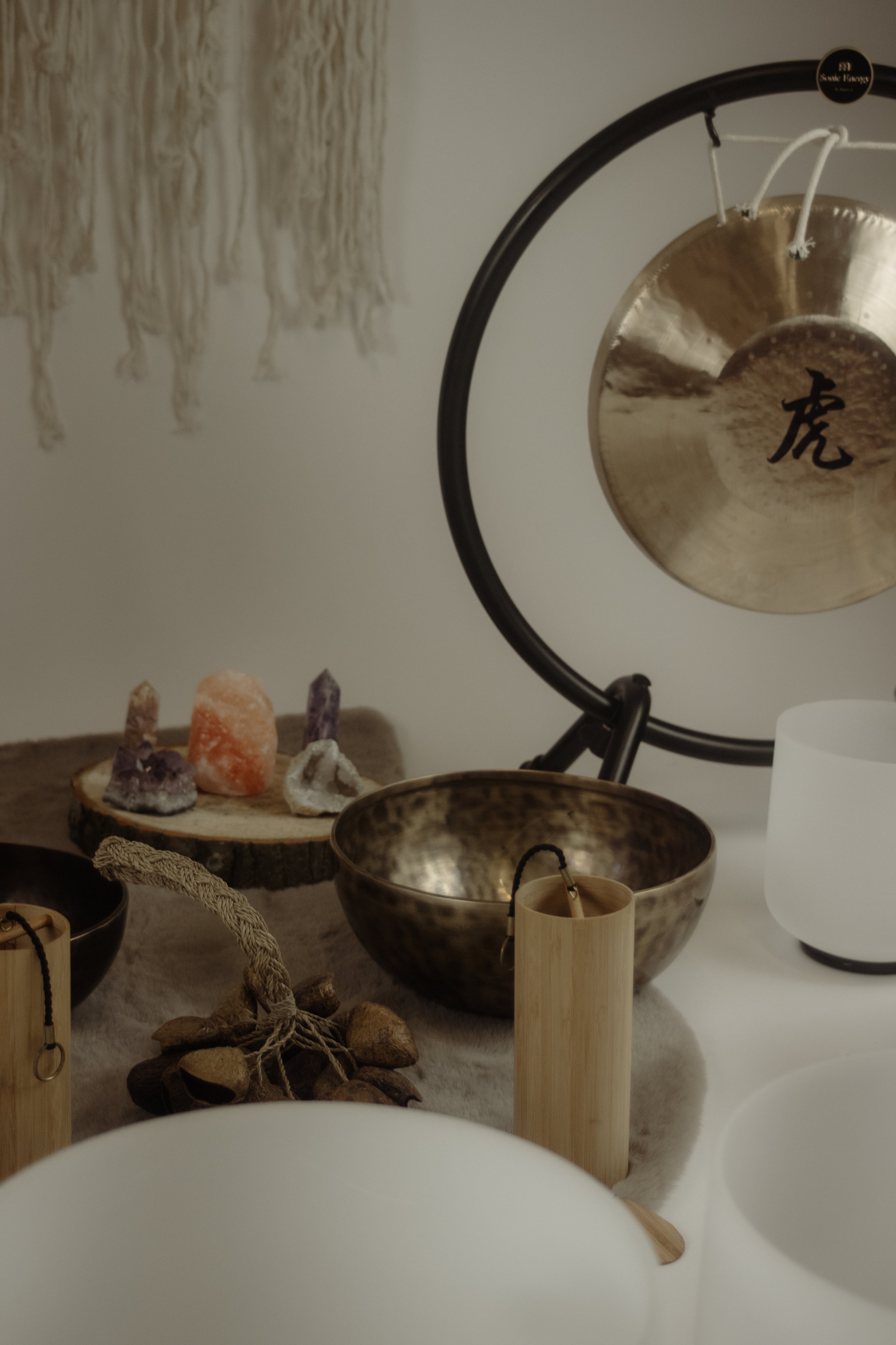 Wellbeing practitioner creating space for rest and reflection through sound