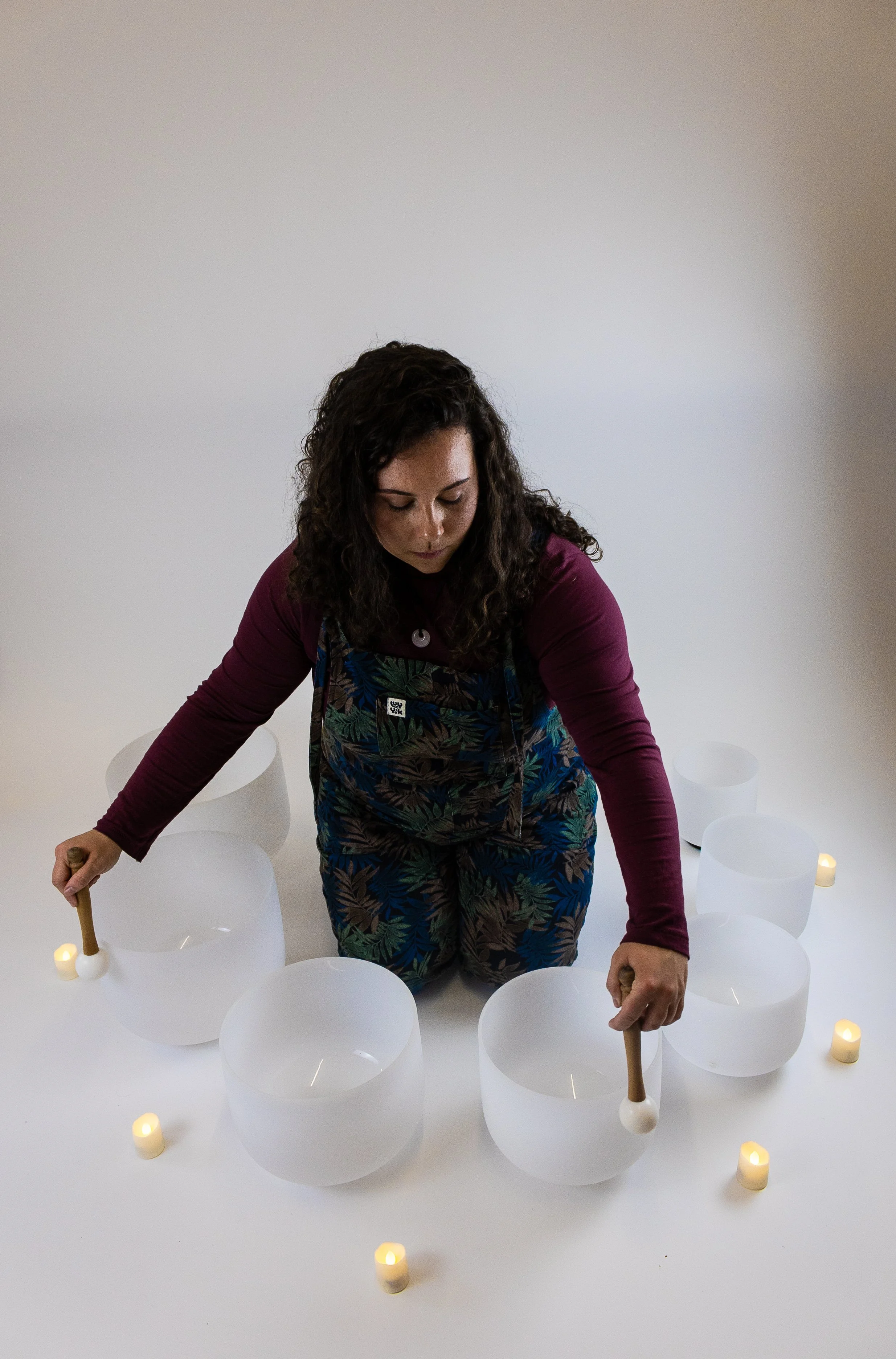 Wellbeing practitioner offering nervous system support through sound