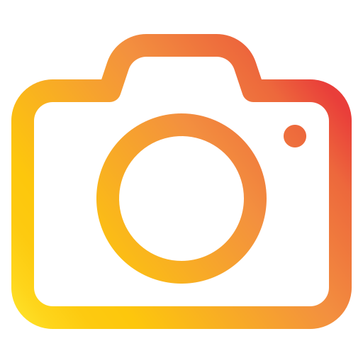 A stylized icon of a camera with a yellow and orange gradient