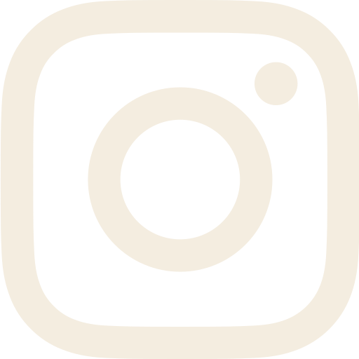 The Instagram logo, a black and white icon with a rounded square and a circle in the center.