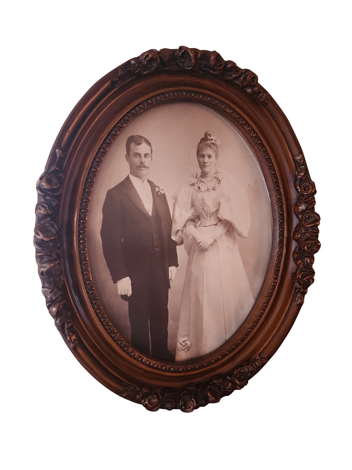 Portrait of the original owner of the house, E.W. Doughty and his wife