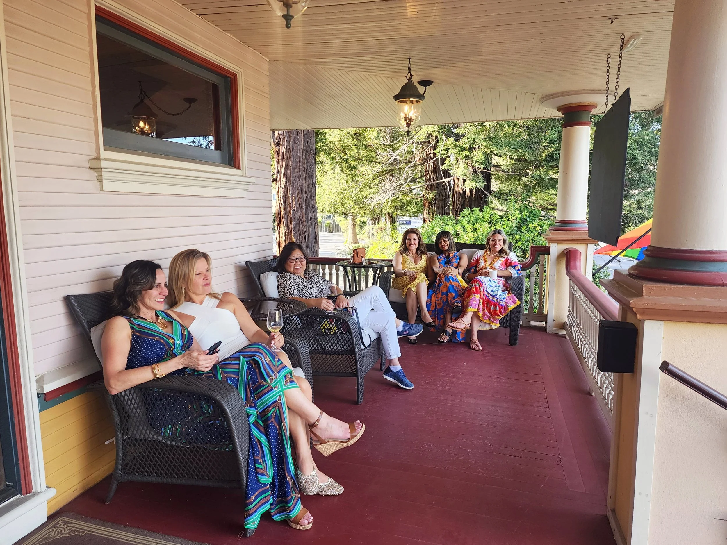 the-charles-napa-valley-front-porch-women-socializing.jpg