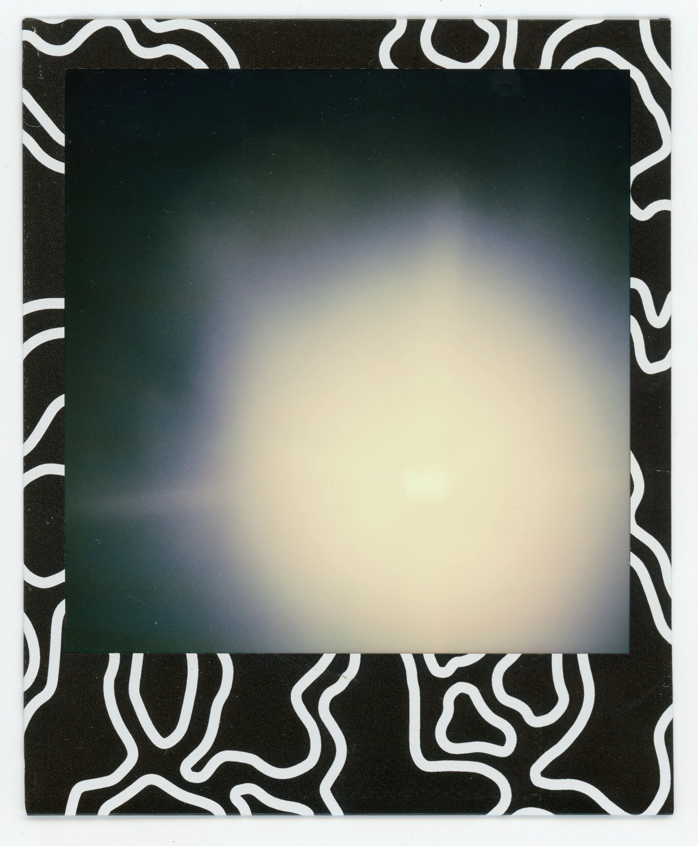 Abstract artwork with a central gradient circle on a black-and-white, irregular line patterned background.