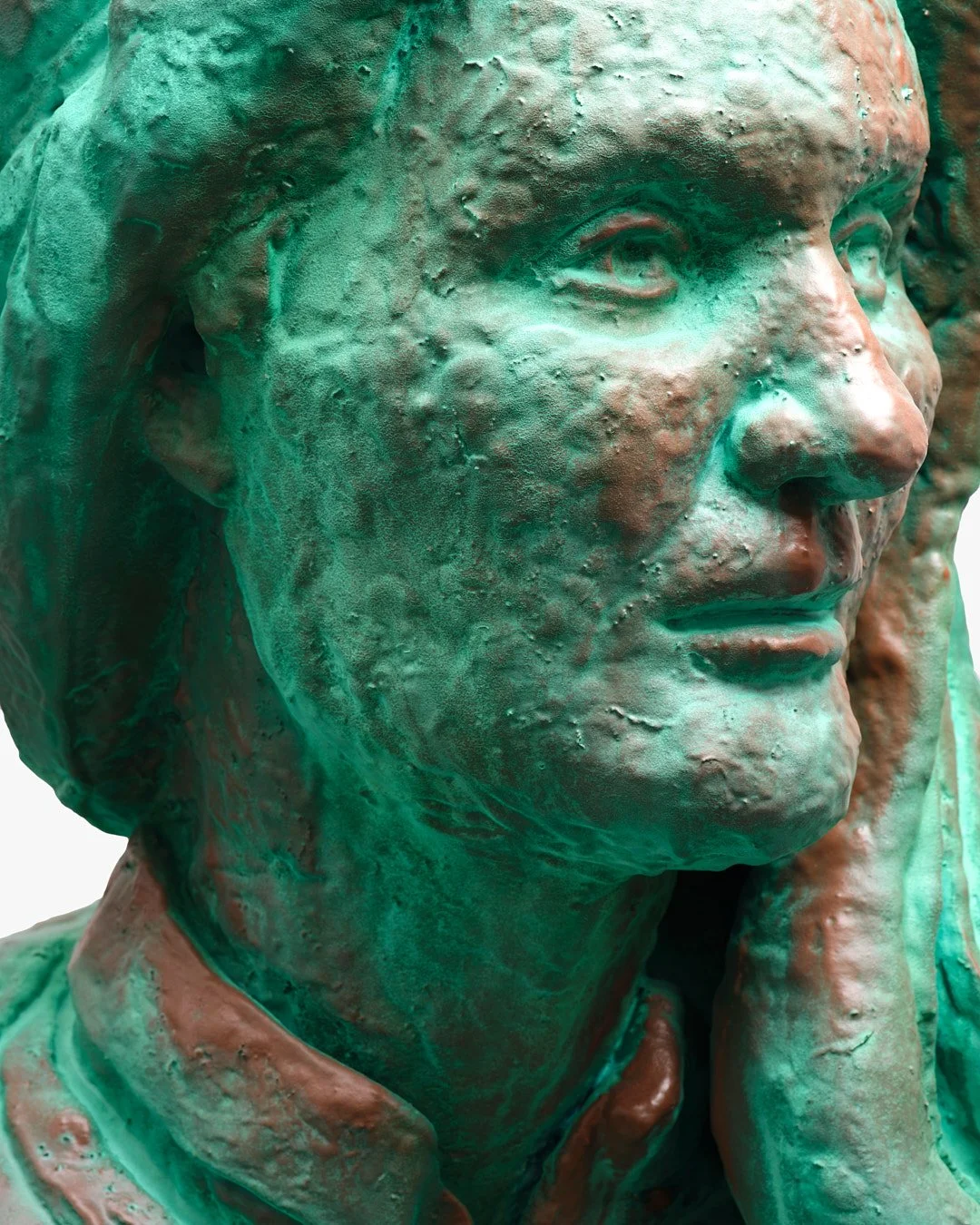 Close-up of a bronze bust of a woman with a textured surface and an expression of contemplation.