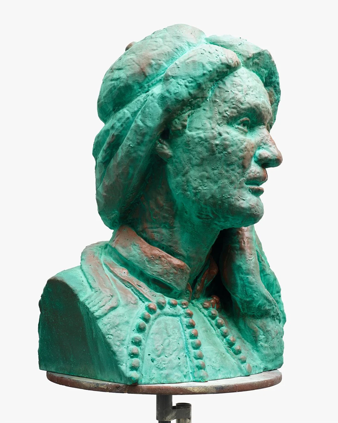 Bronze sculpture bust of a woman with detailed facial features, wearing a collared garment and a string of beads or pearls around her neck.