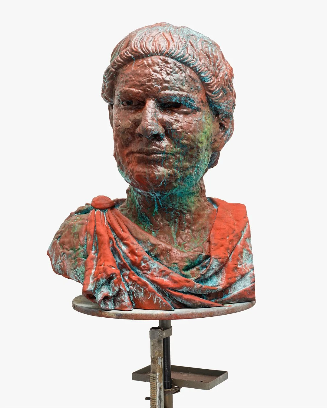 Colorful bronze bust sculpture of a woman wearing a toga, displayed on a stand.