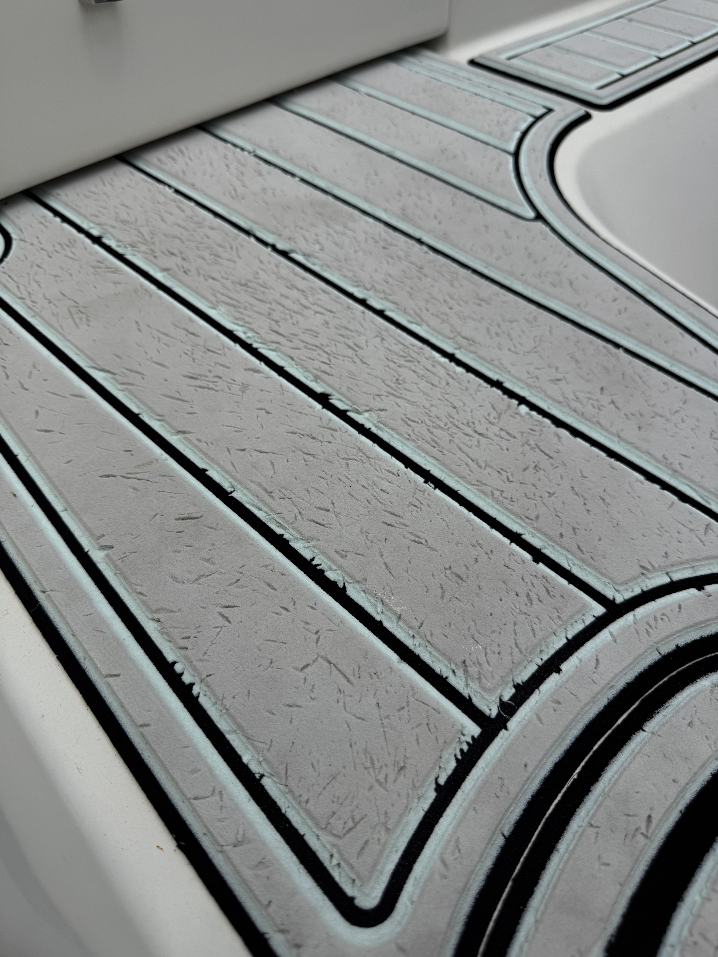 Close-up of EVA Foam with scratches and wear after a few months of use