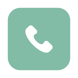 Icon of a white telephone receiver on a green background.