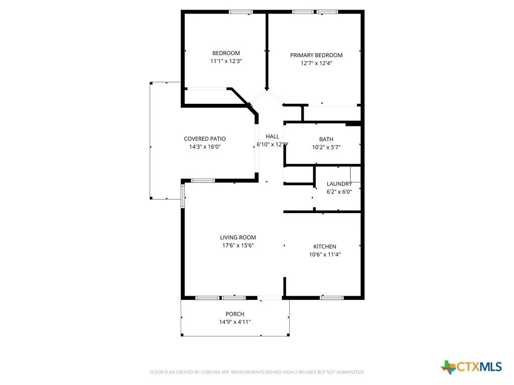 Floor plan of a house with labeled rooms: porch, living room, kitchen, laundry, hall, bathroom, bedrooms, and covered patio.