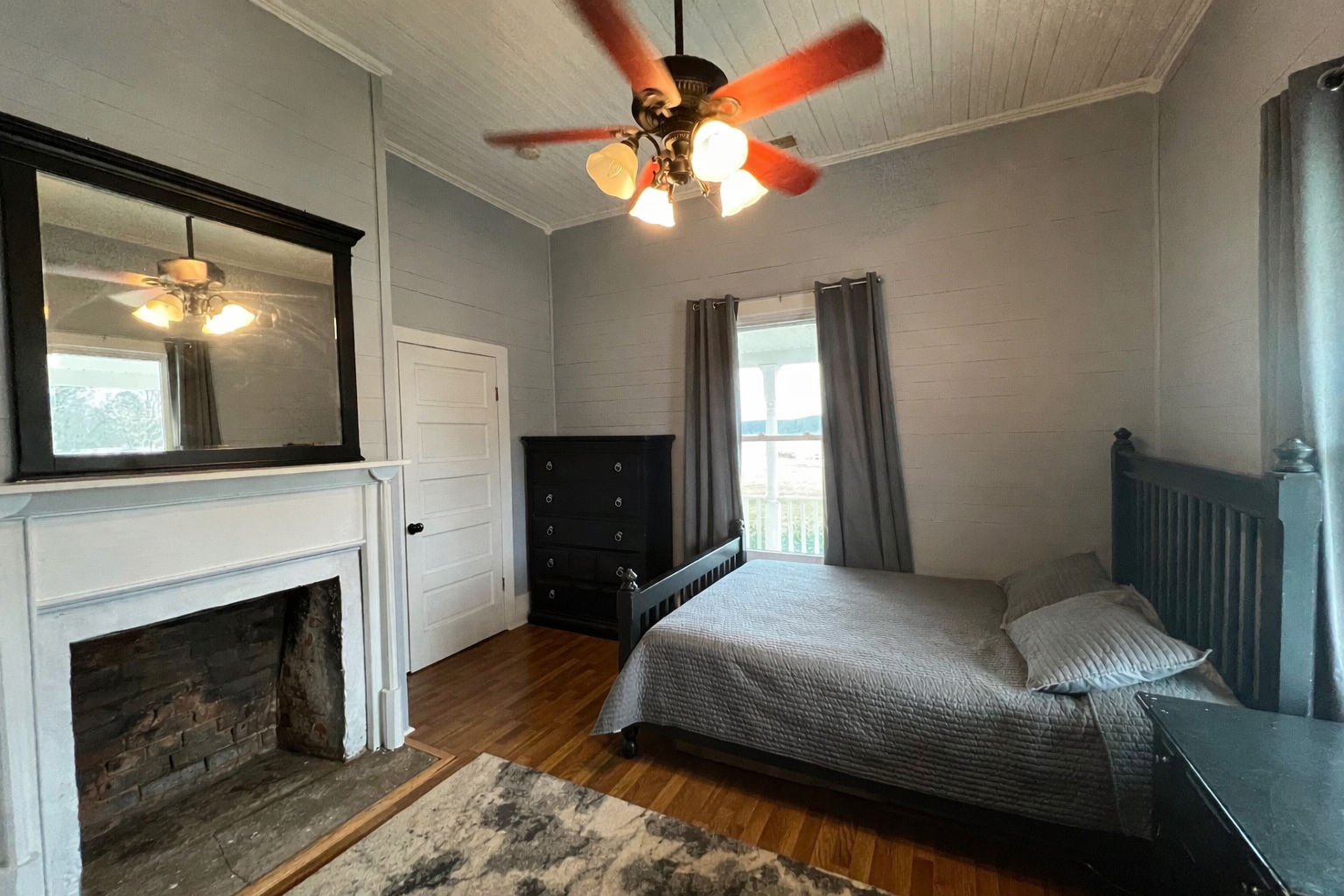 Bedroom 3: Queen Bed, Dresser, (Television and Desk not pictured), Private Bathroom (w/shower)