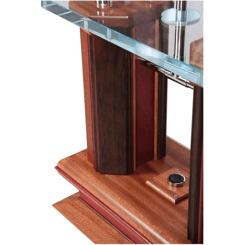 Close-up of a wooden lamp with glass accent and push button power switch.