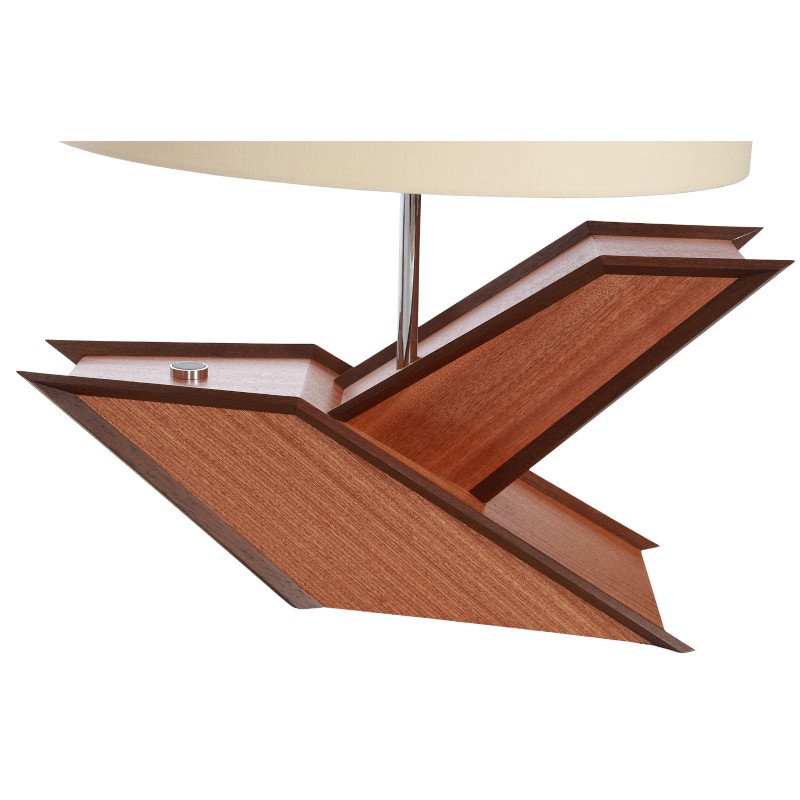 A modern wooden lamp with a tilted design, featuring an oval beige shade and a small cylindrical metallic push button switch on the surface.