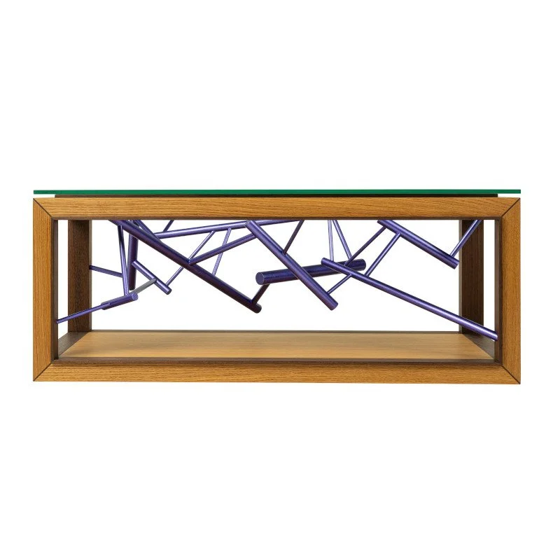 Modern art sculpture with metallic painted dowel rods inside a wooden rectangular frame.