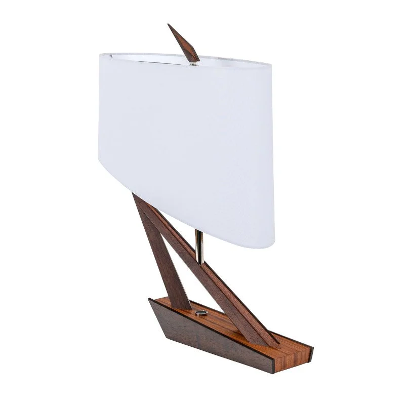 A sailboat-shaped desk lamp with a white lampshade and a wooden base resembling a boat, featuring a small wooden sail and a sleek modern design.