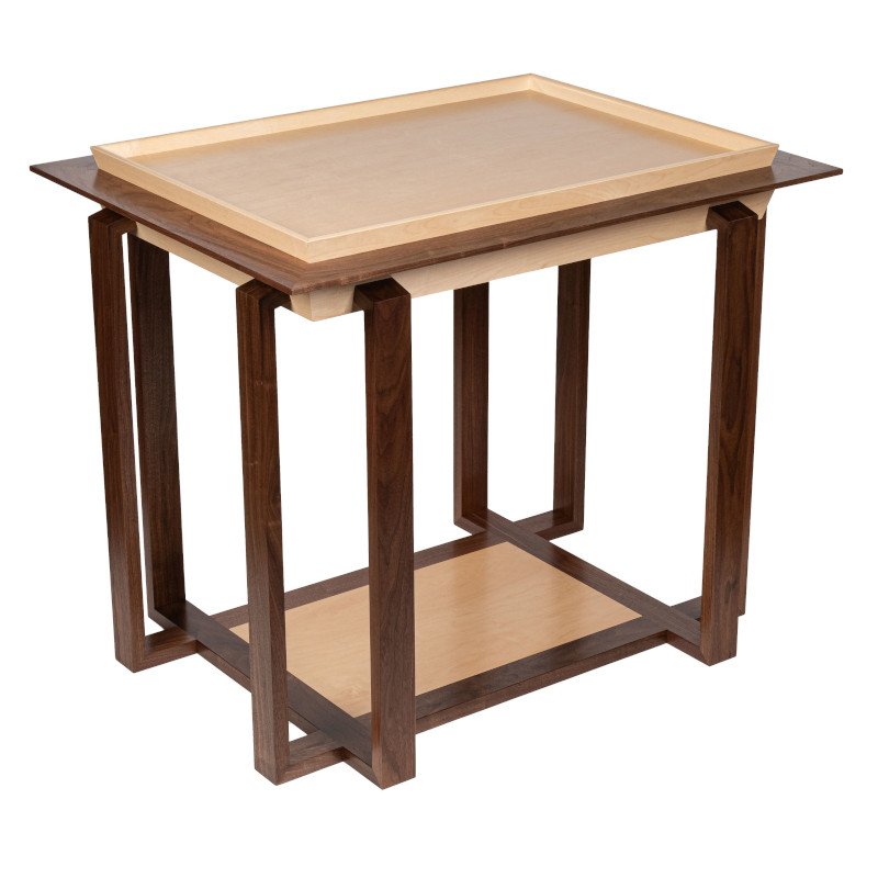 A wooden side table with a two-tone finish and a lower shelf.