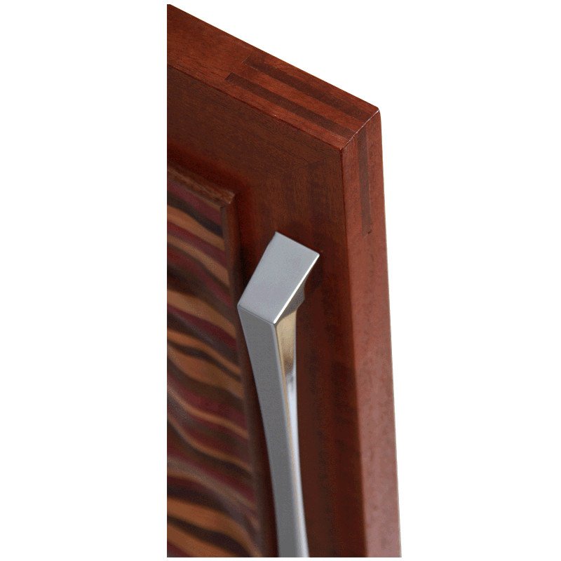 Close-up of a wooden door with mitered bridle joint and metal handle.