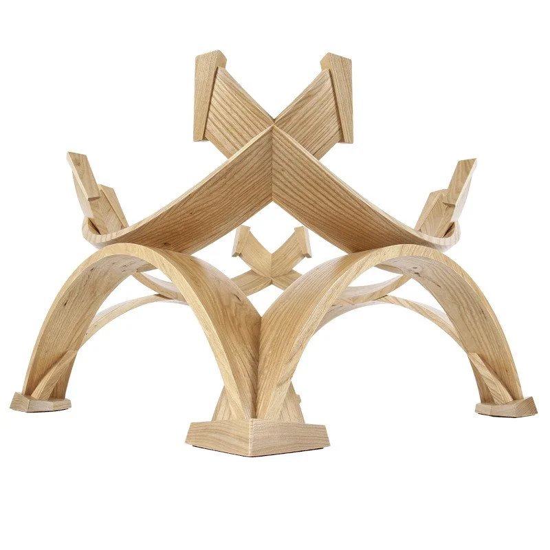 A custom made geometric wood coffee table base.