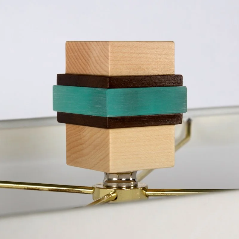 Aqua Undertone lamp finial in maple and Peruvian walnut