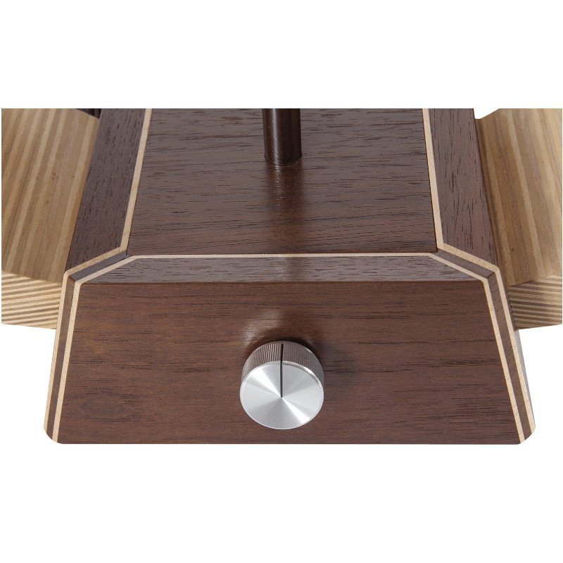 Close-up of a wooden base with power switch on a modern custom made lamp.