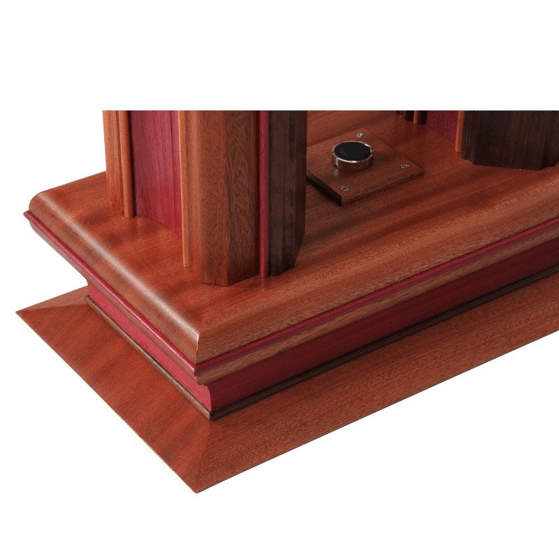 Close-up of a wooden lamp base with detailed grain and layered design.