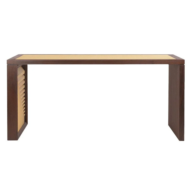 A modern wooden desk with a light-colored top and darker side panels, featuring a decorative slatted design on one side.