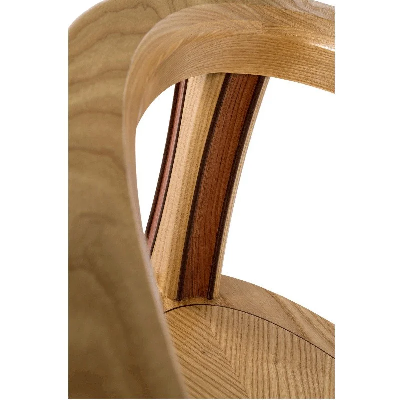 Close-up of a wooden coffee table leg showing multiple wood species.