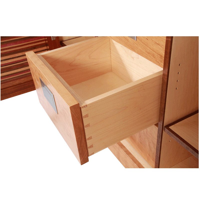 Open wooden drawer with dovetail joinery.