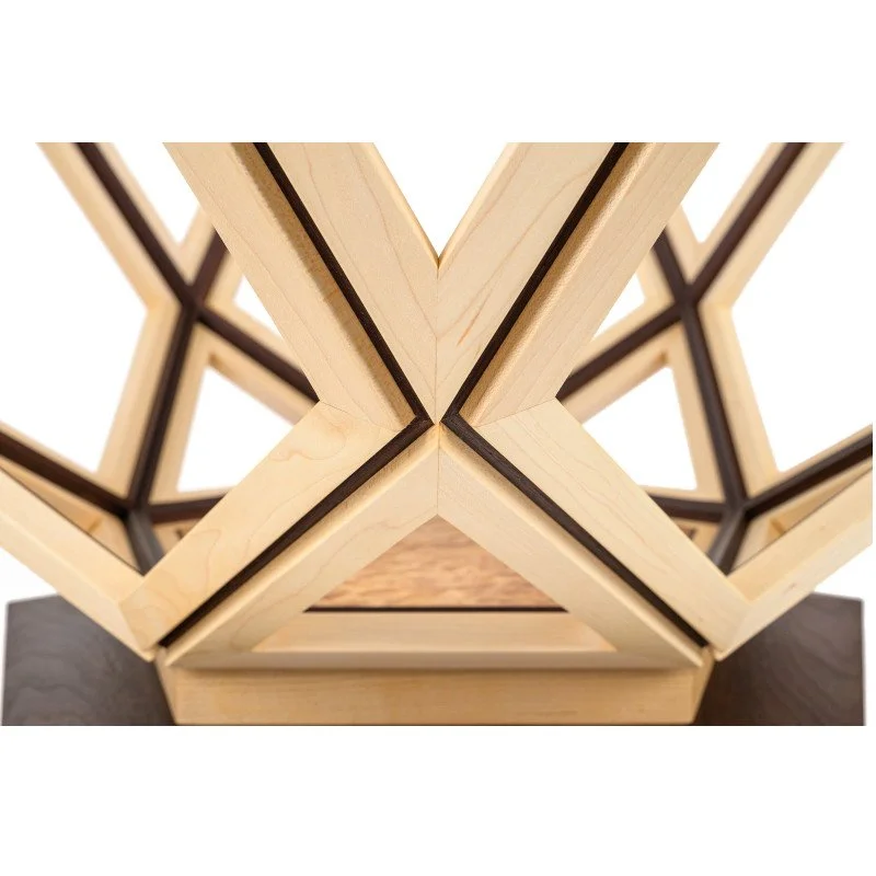 Close-up of a modern geometric wooden coffee table detail.