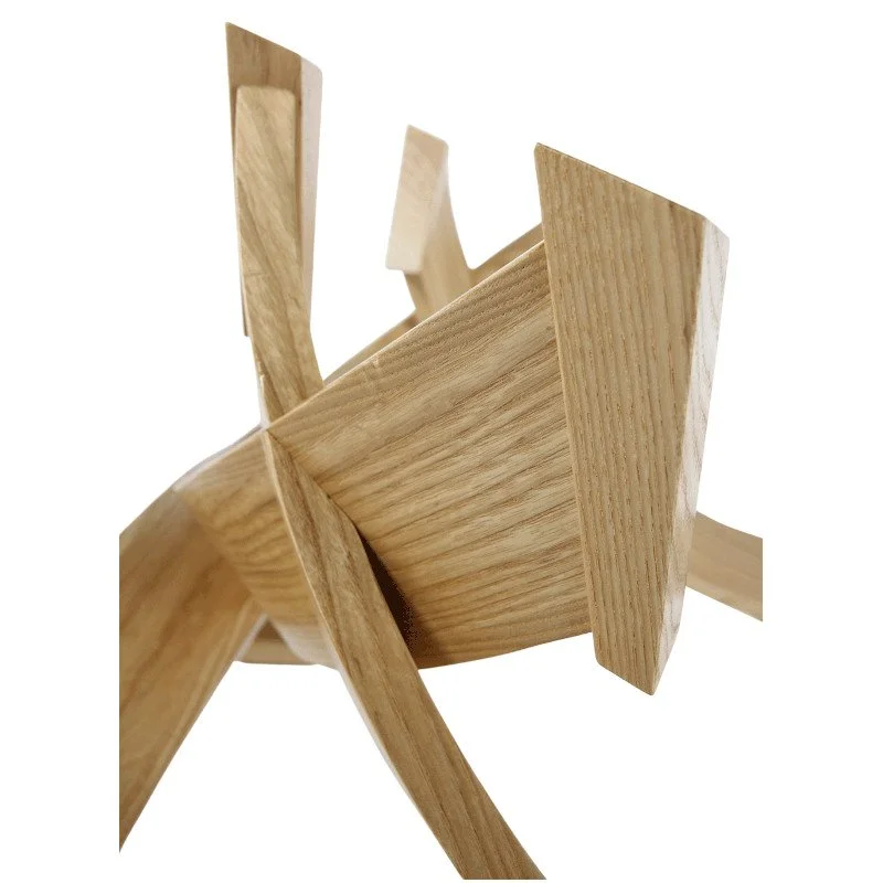 Close-up of a wooden detail on a modern coffee table.