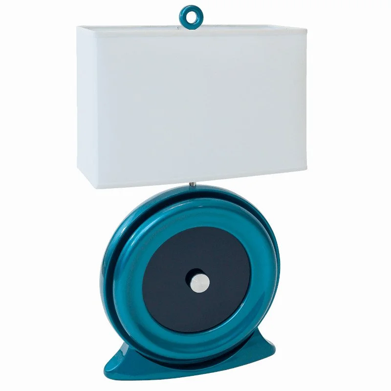A decorative lamp design with black glass, an aluminum knob, and a white lampshade on top and a teal-blue body at the bottom.