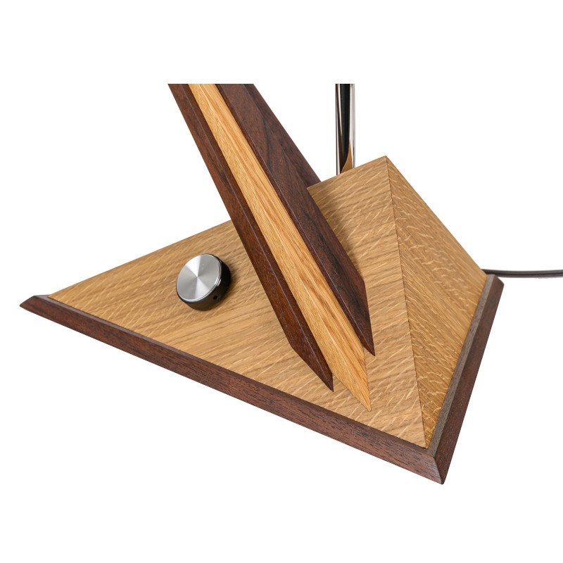 Close-up of a custom made mid-century modern lamp with a metallic knob.