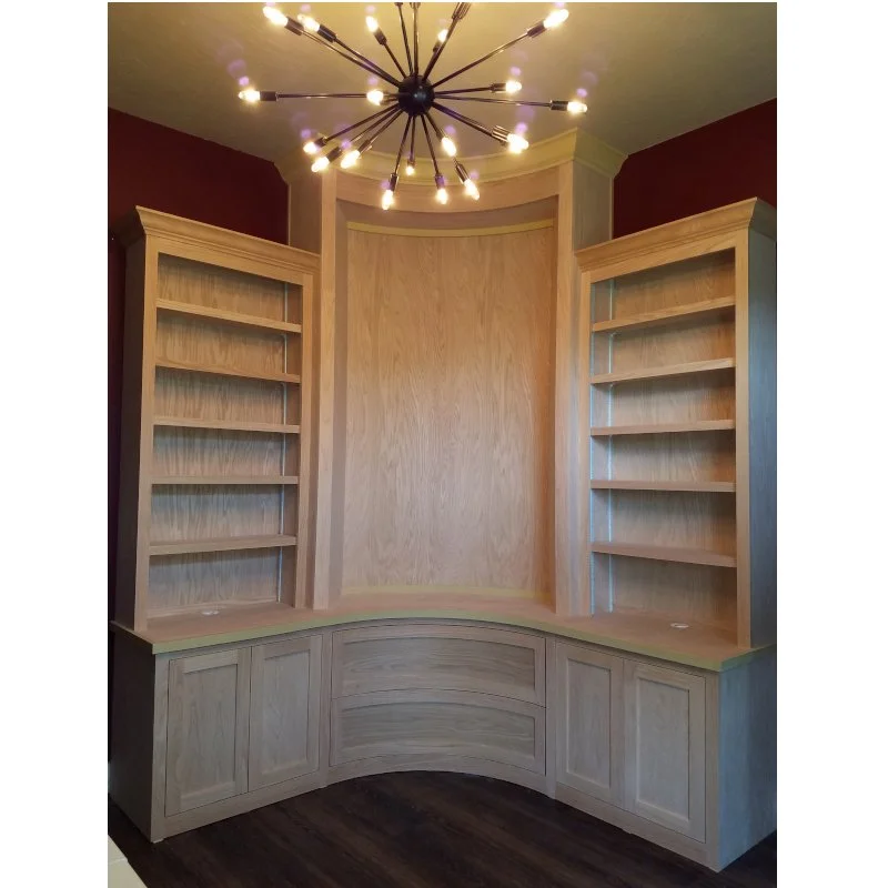 Curved bookcase on curved office wall